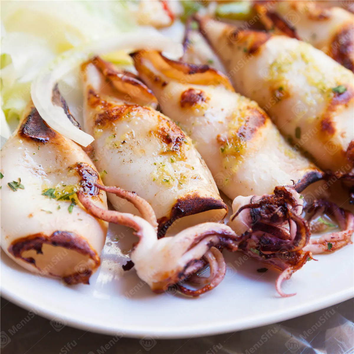 Grilled squid with garlic and herbs at Ocean Crab Marysville, a Seafood Restaurant in Marysville