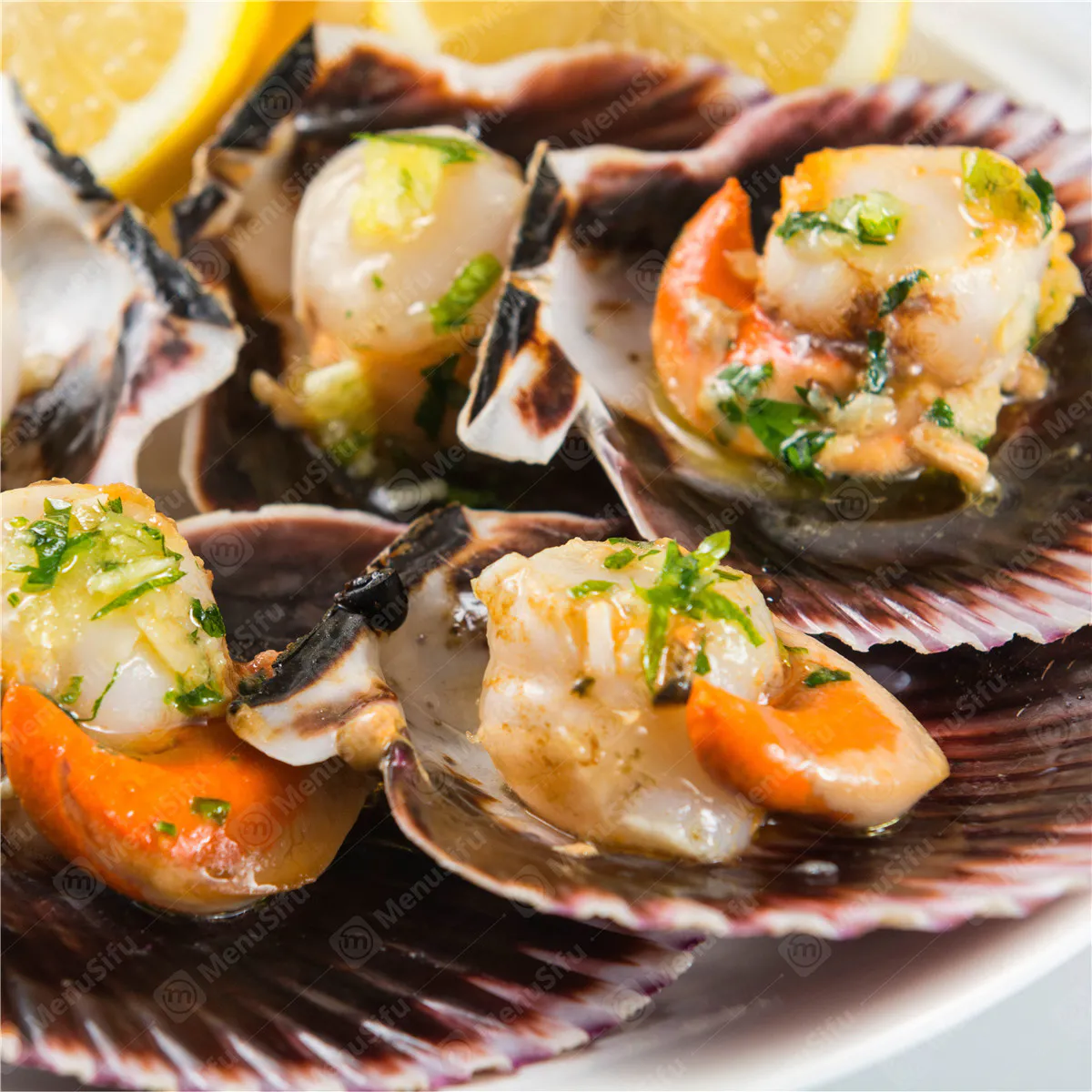 Grilled scallops with butter, herbs and lemon at Ocean Crab Marysville, a Seafood Restaurant in Marysville